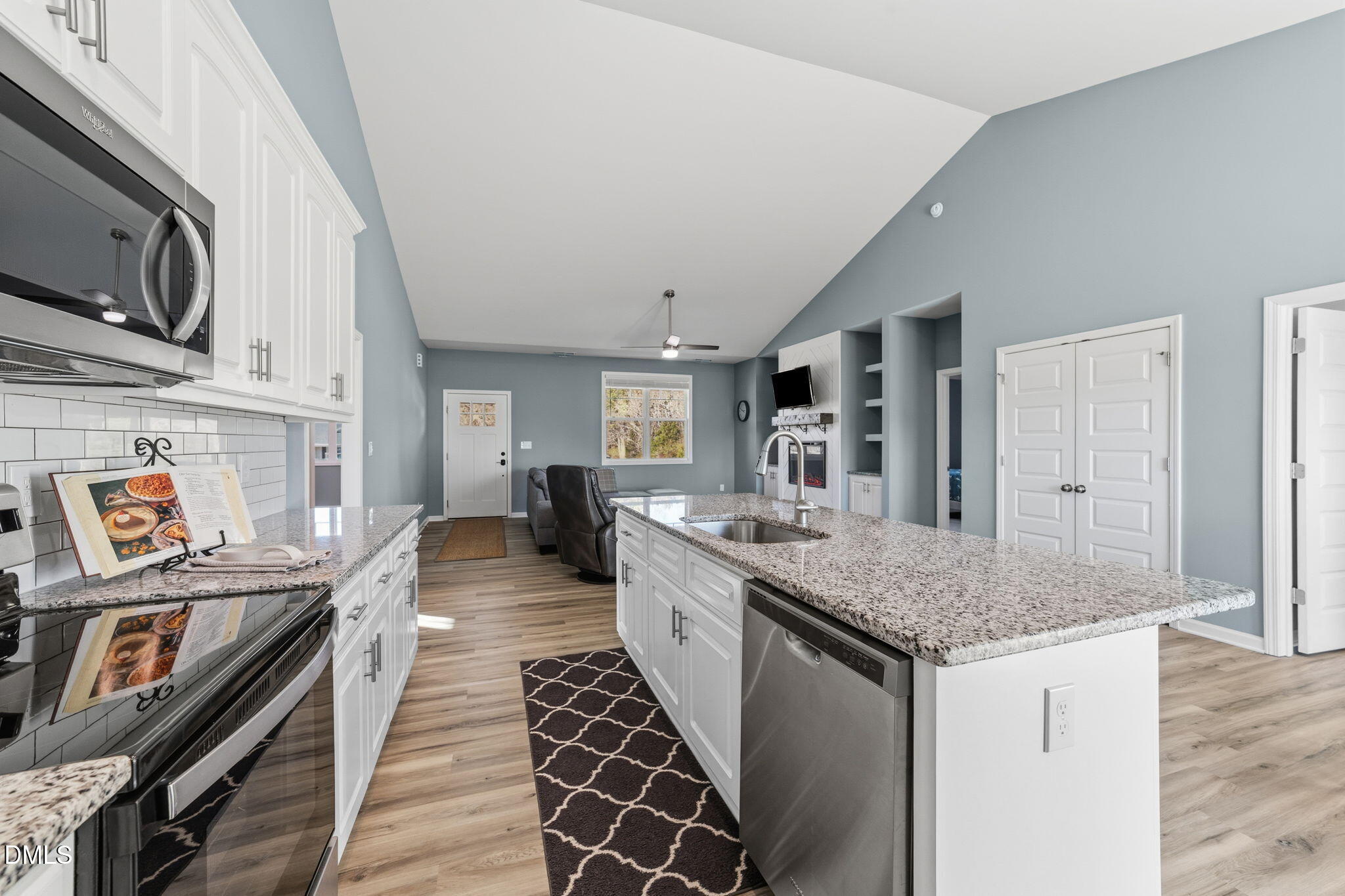 4029 Needham Road Bailey, NC 27807 - Photo 11 of 21 a kitchen with stainless steel appliances granite countertop a stove and a sink