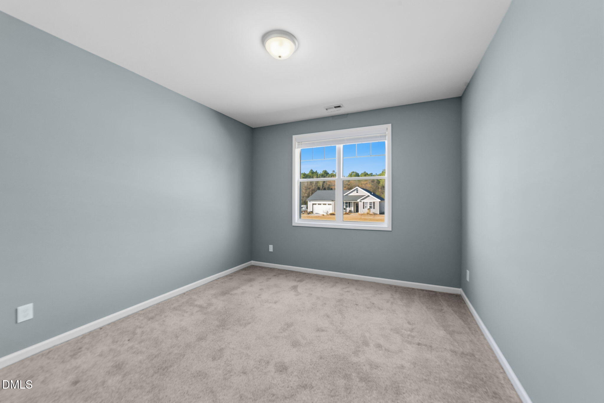 4029 Needham Road Bailey, NC 27807 - Photo 18 of 21 an empty room with windows