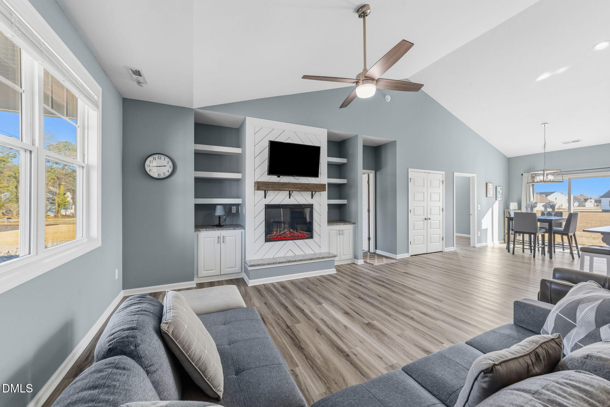 4029 Needham Road Bailey, NC 27807 - Photo 5 of 21 a spacious bedroom with a bed and a flat screen tv
