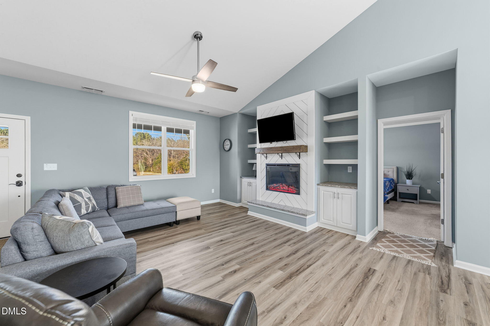4029 Needham Road Bailey, NC 27807 - Photo 6 of 21 a living room with furniture and a fireplace