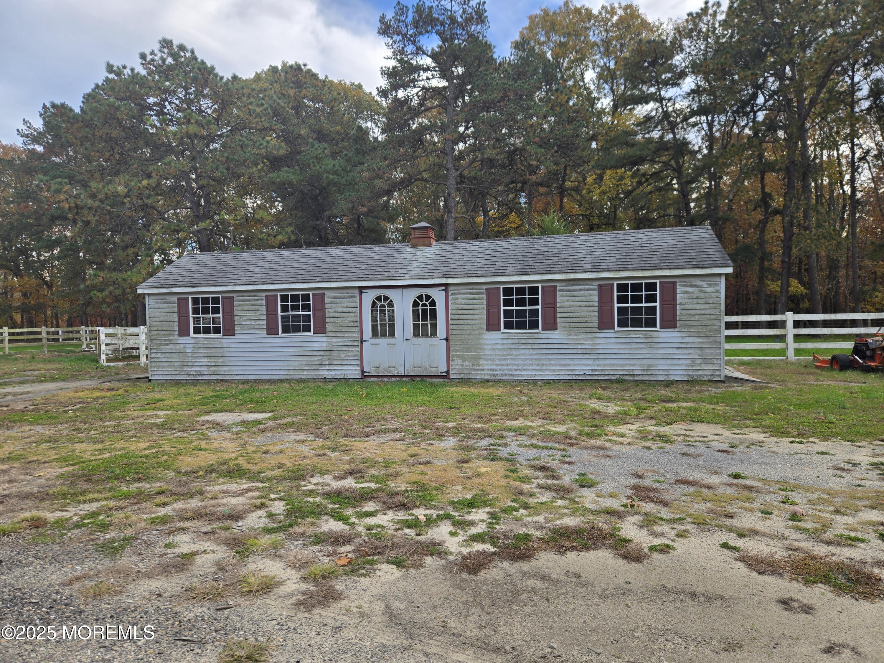 300 Toms River Road Jackson, NJ 08527 - Photo 7 of 16 a view of a house with a backyard