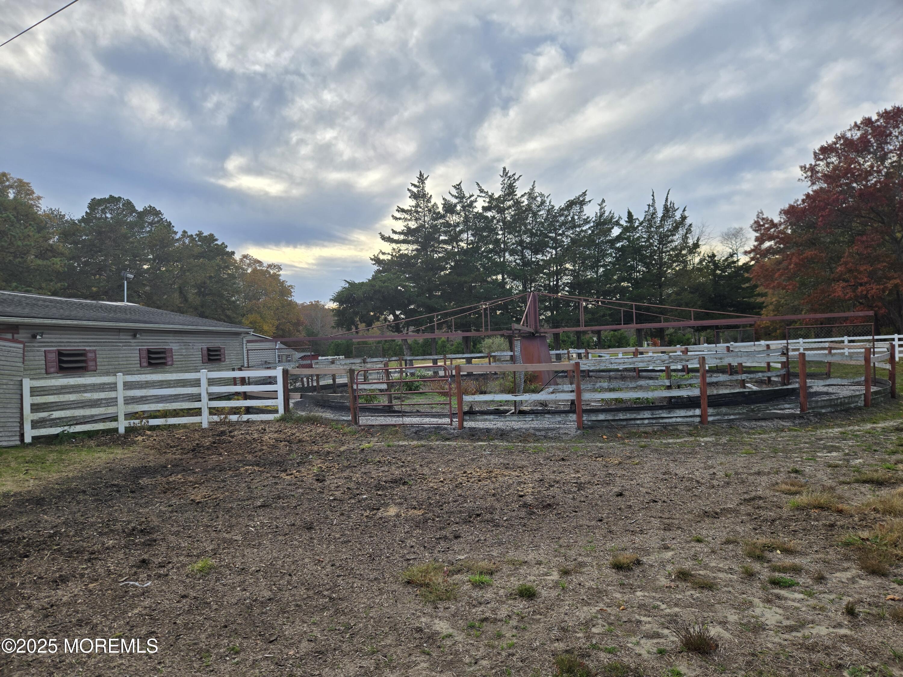 300 Toms River Road Jackson, NJ 08527 - Photo 9 of 16 a view of a yard with wooden fence