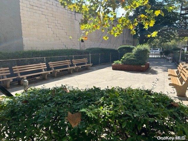 99-10 60th Avenue, Unit 5L Queens, NY 11368 - Photo 12 of 13 a view of a backyard