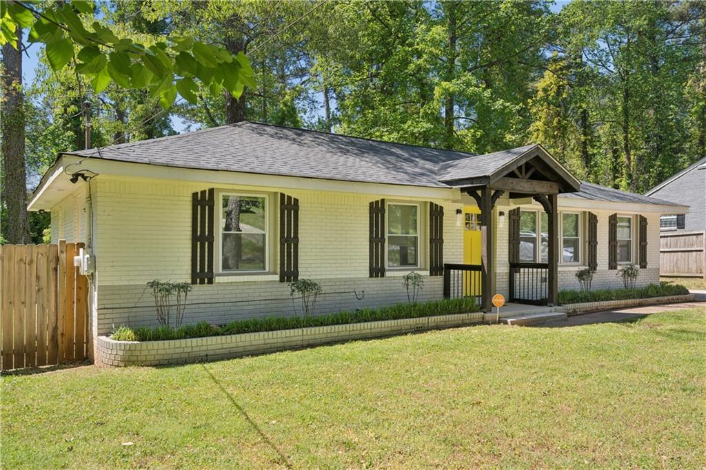 2357 Scotty Circle Decatur, GA 30032 - Photo 2 of 44 a front view of a house with a yard