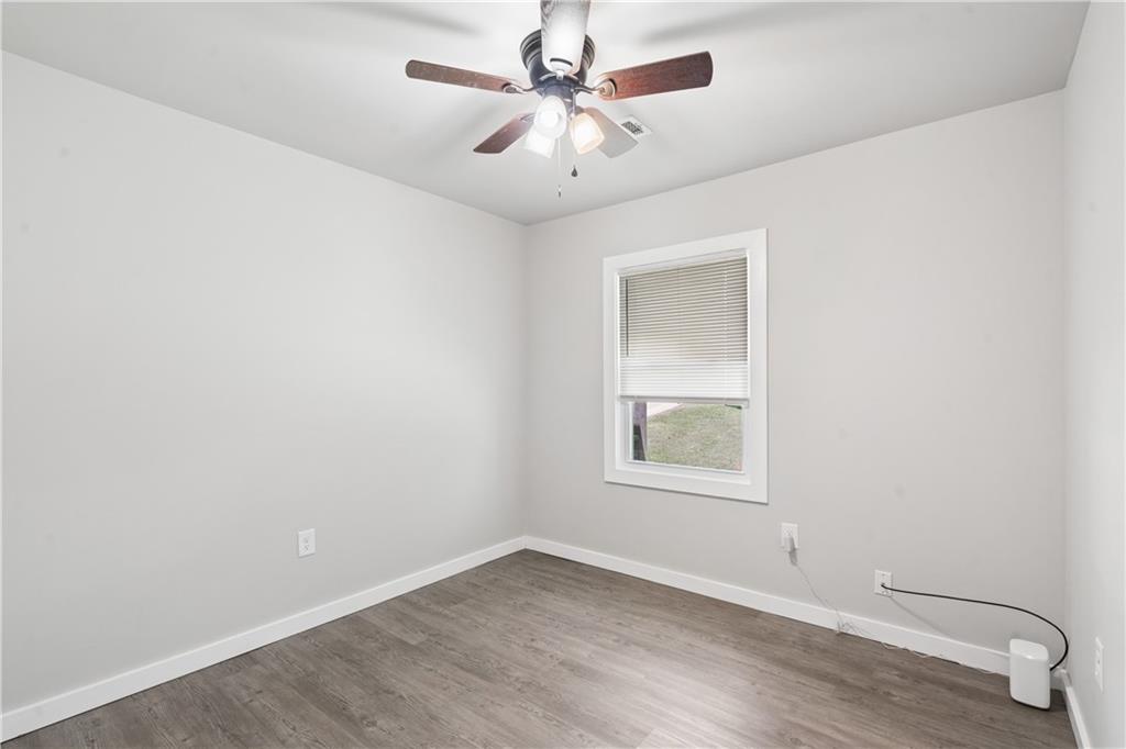 2357 Scotty Circle Decatur, GA 30032 - Photo 33 of 44 an empty room with a window and a fan