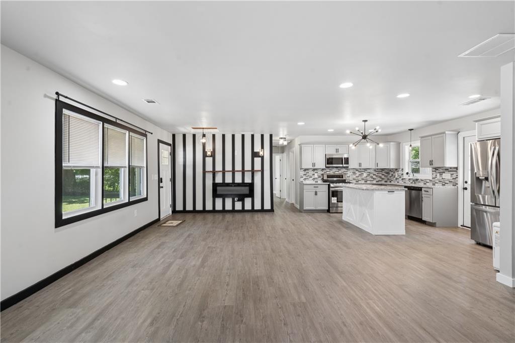 2357 Scotty Circle Decatur, GA 30032 - Photo 9 of 44 a view of kitchen with wooden floor and electronic appliances