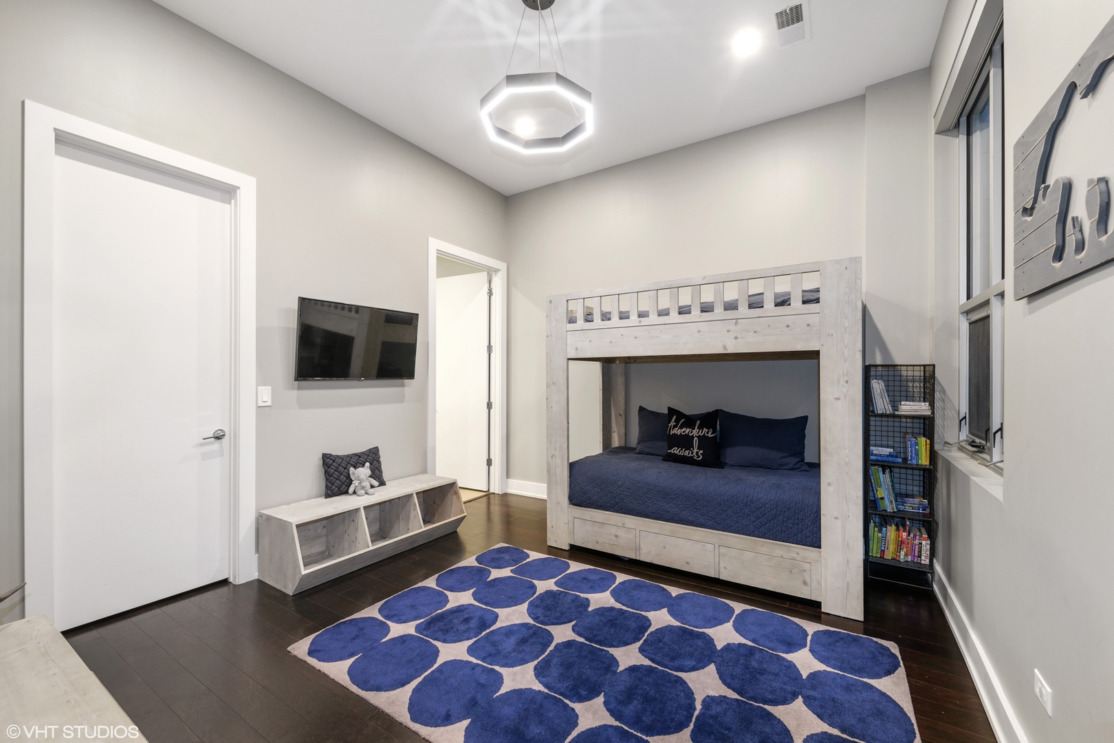 18 North Carpenter Street, Unit PHS Chicago, IL 60607 - Photo 21 of 33 a bedroom with furniture and a fireplace