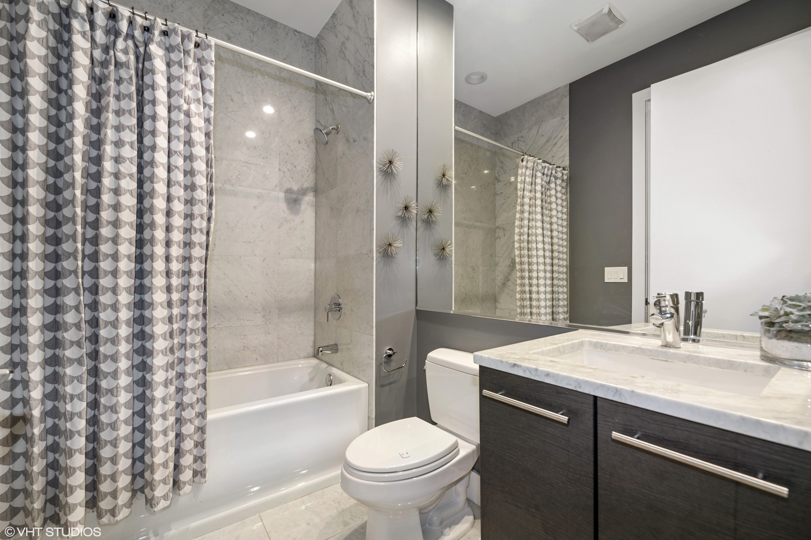 18 North Carpenter Street, Unit PHS Chicago, IL 60607 - Photo 24 of 33 a bathroom with a sink a toilet and shower