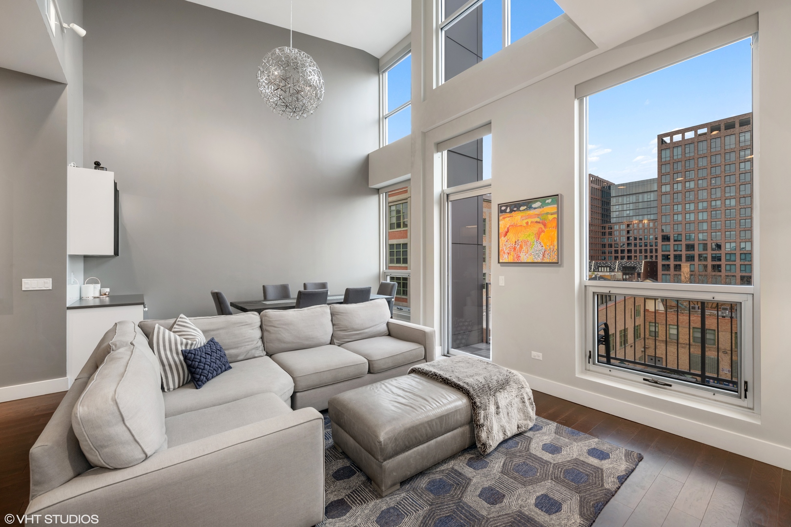 18 North Carpenter Street, Unit PHS Chicago, IL 60607 - Photo 7 of 33 a living room with furniture and a window