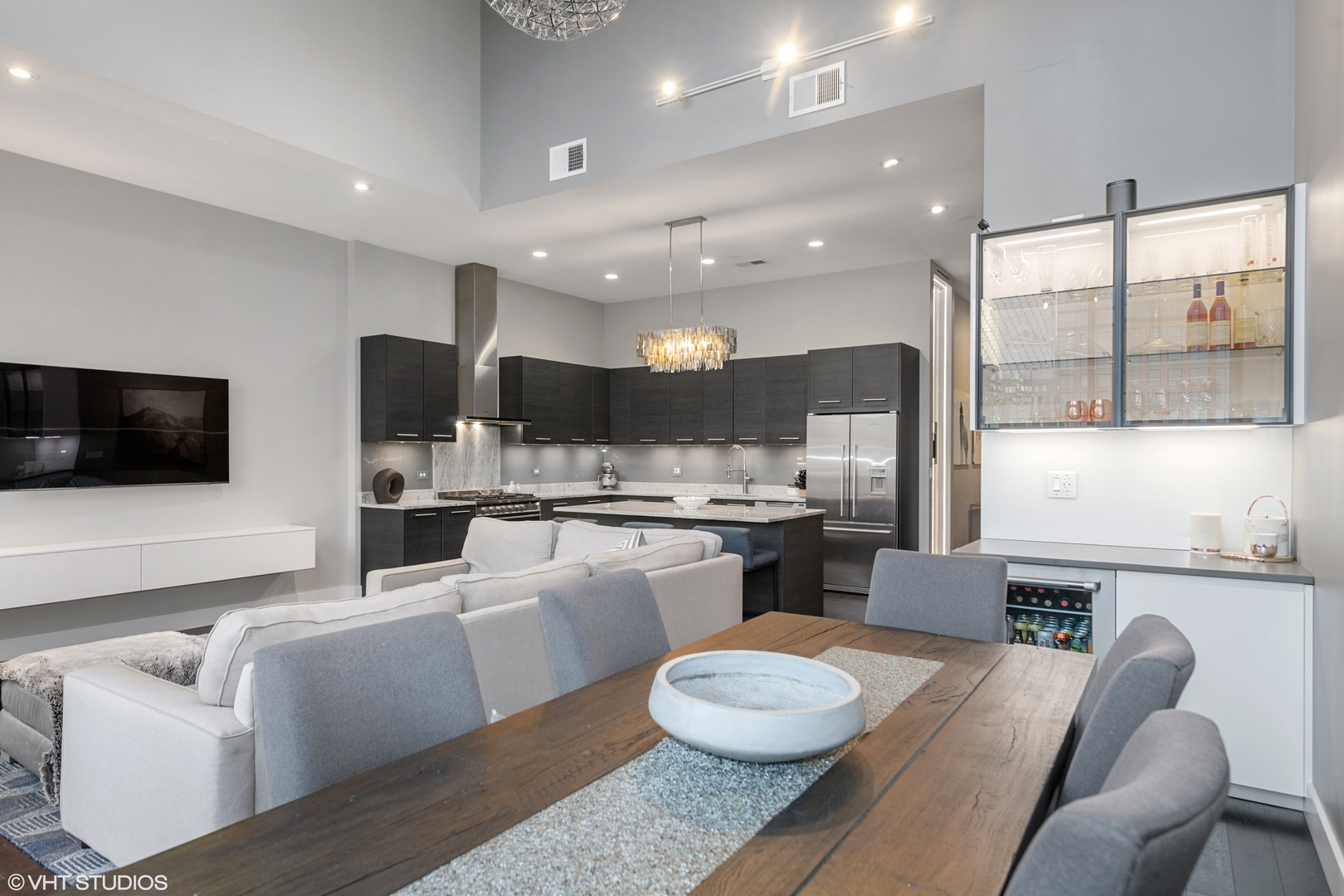 18 North Carpenter Street, Unit PHS Chicago, IL 60607 - Photo 9 of 33 a large white kitchen with a large window