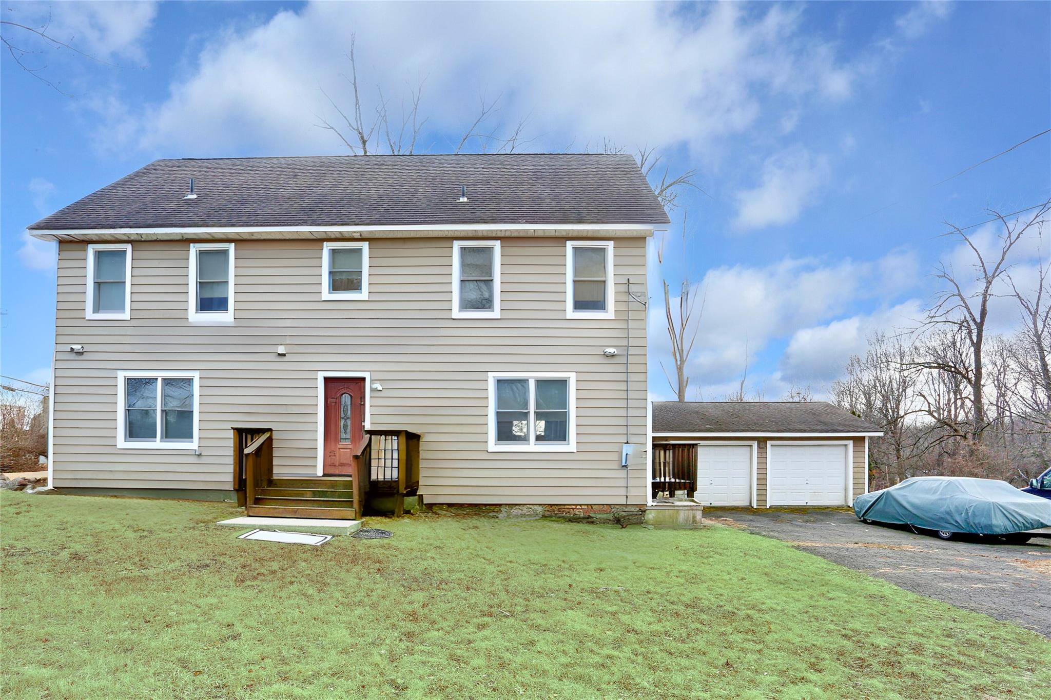 View of front of home featuring a front yard