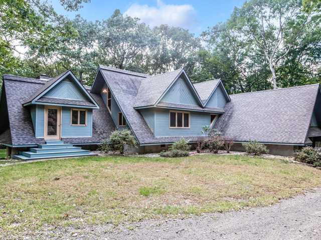 104 Watering Pond Road Guilford, CT 06437 - Photo 1 of 1 a front view of a house with a yard