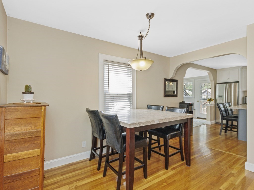 435 Old Post Road Walpole, MA 02081 - Photo 14 of 36 a view of a dining room with furniture and wooden floor