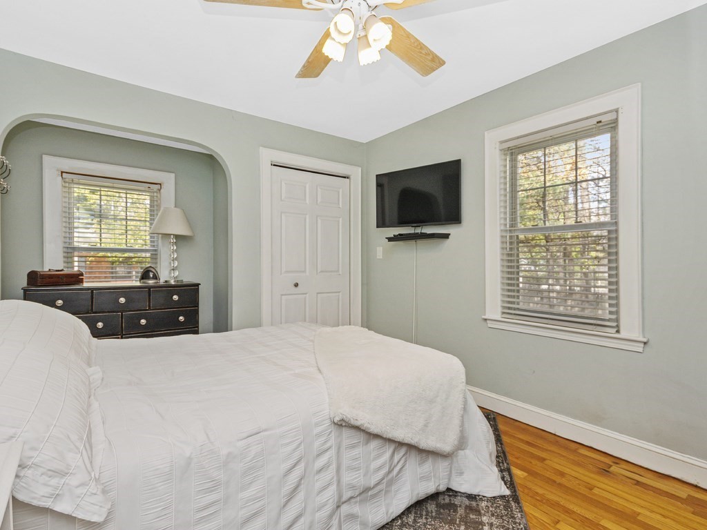 435 Old Post Road Walpole, MA 02081 - Photo 18 of 36 a bedroom with a bed and a flat screen tv