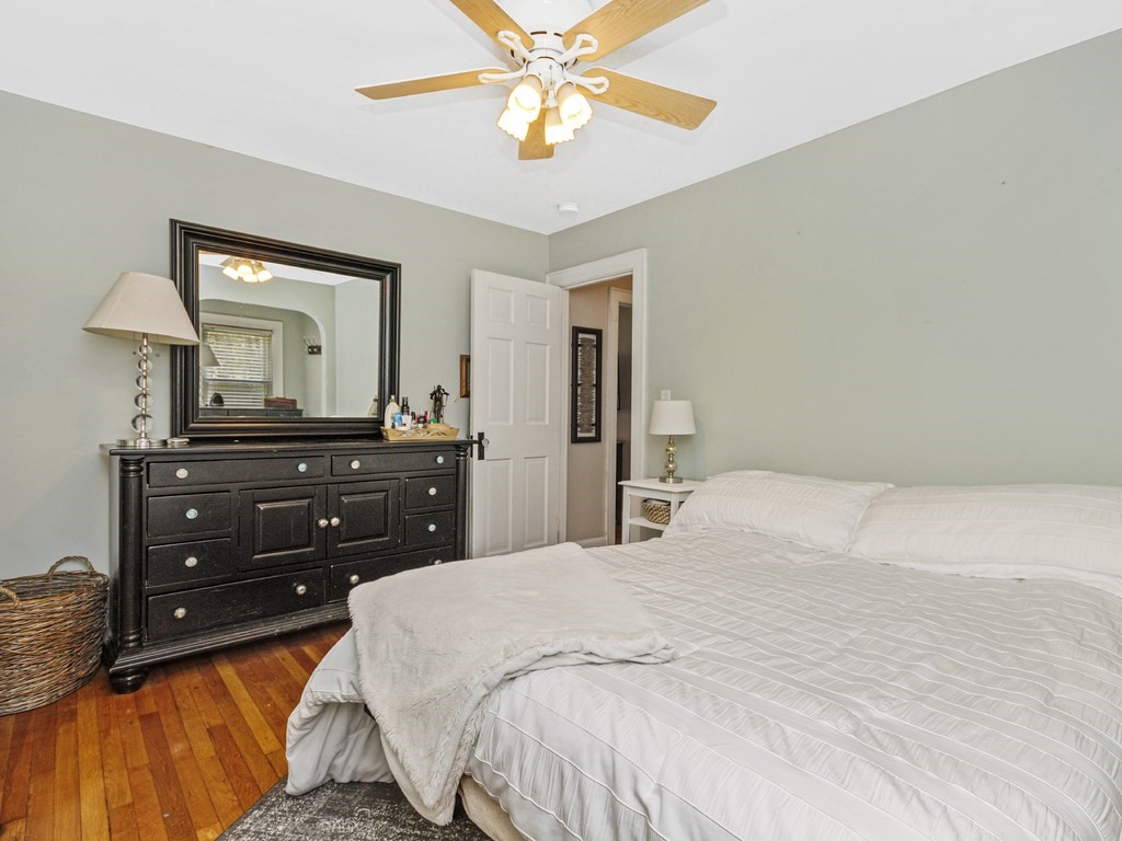 435 Old Post Road Walpole, MA 02081 - Photo 19 of 36 a bedroom with a bed and a mirror on dresser
