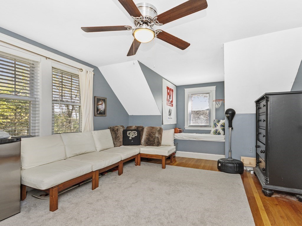 435 Old Post Road Walpole, MA 02081 - Photo 22 of 36 a living room with furniture and a flat screen tv