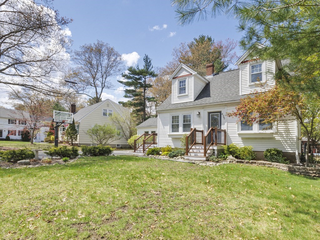 435 Old Post Road Walpole, MA 02081 - Photo 3 of 36 a front view of a house with garden and porch