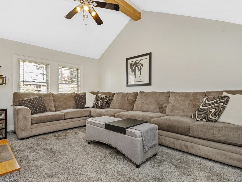 435 Old Post Road Walpole, MA 02081 - Photo 9 of 36 a living room with a couch