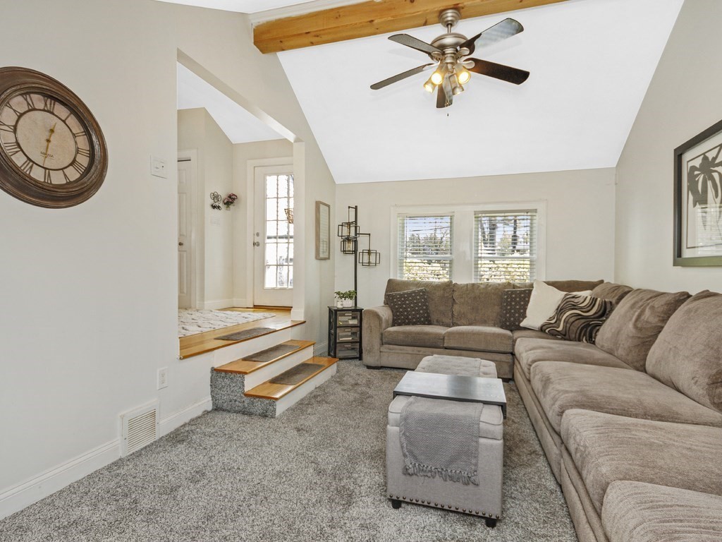 435 Old Post Road Walpole, MA 02081 - Photo 10 of 36 a living room with furniture and a large window
