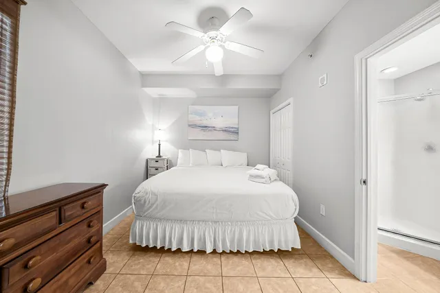 a view of a hallway with furniture and a livingroom view