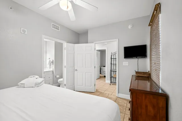 a bathroom with a sink a mirror and a toilet