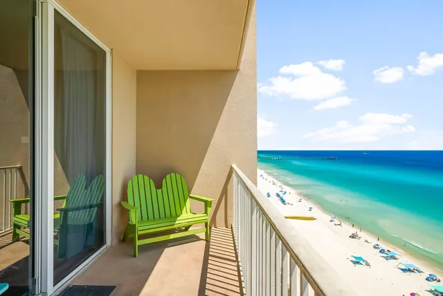a view of a swimming pool with an outdoor seating