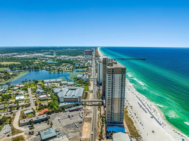 a view of a room with workspace and a window