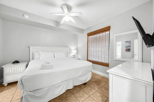 a bathroom with a toilet a sink and bathtub