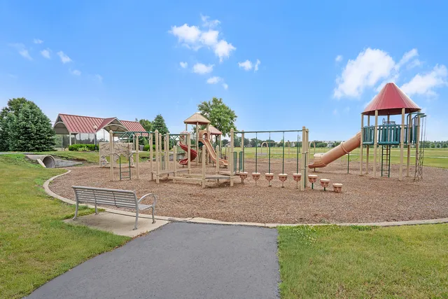 a view of a house with a park
