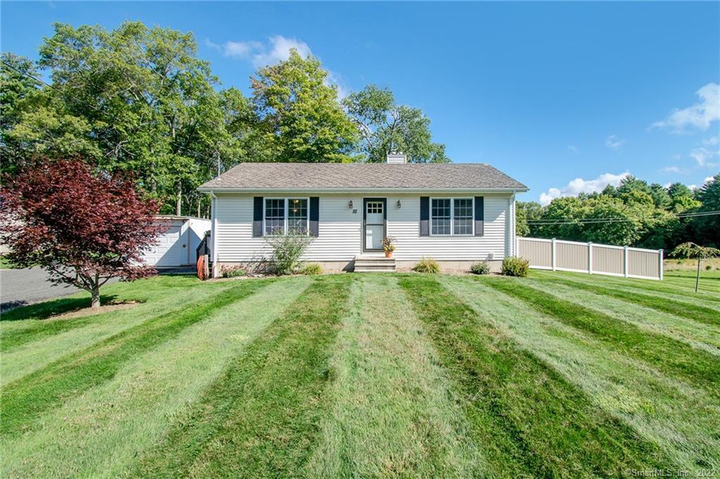 92 Pinney Hill Road Willington, CT 06279 - Photo 1 of 1 a front view of house with yard and green space