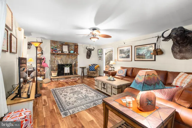 a bedroom with a bed and a table in it