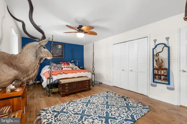 a bathroom with a tub and shower