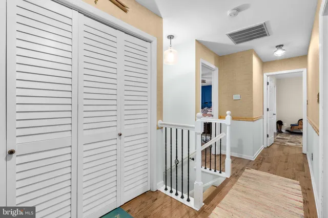 a view of a livingroom with furniture and a window