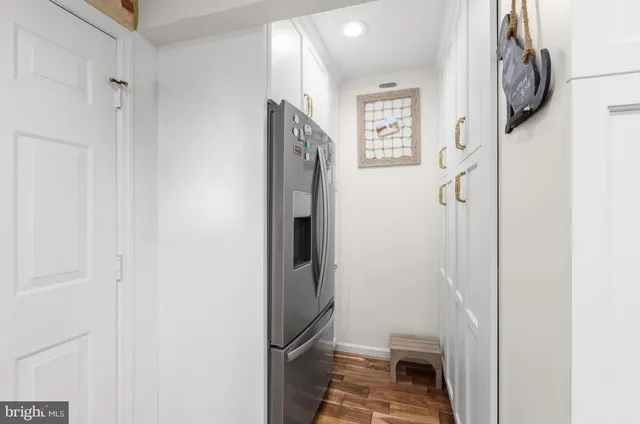 a bathroom with a granite countertop shower and a sink