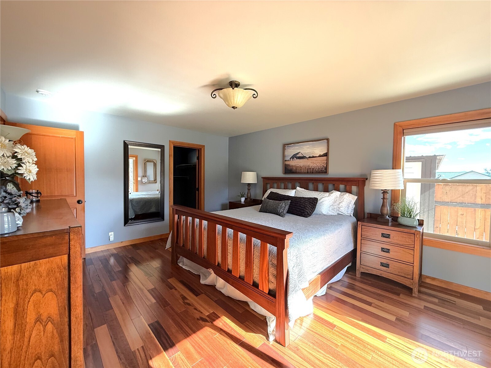 8 Julian Bay Road Republic, WA 99166 - Photo 6 of 40 a bedroom with a bed and wooden floor