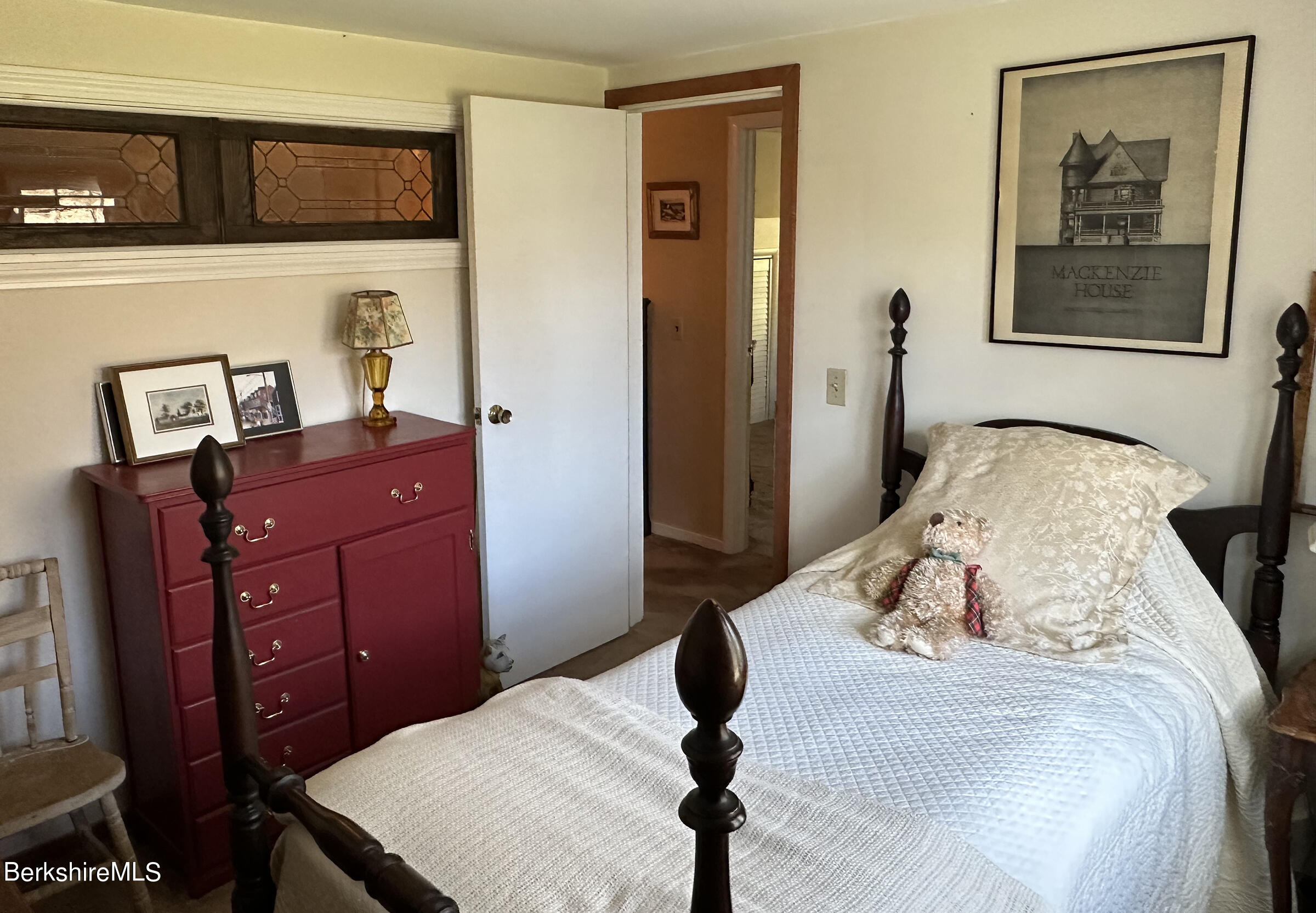 224 County Rte 7A Copake, NY 12516 - Photo 13 of 14 a bedroom with a bed and a dresser