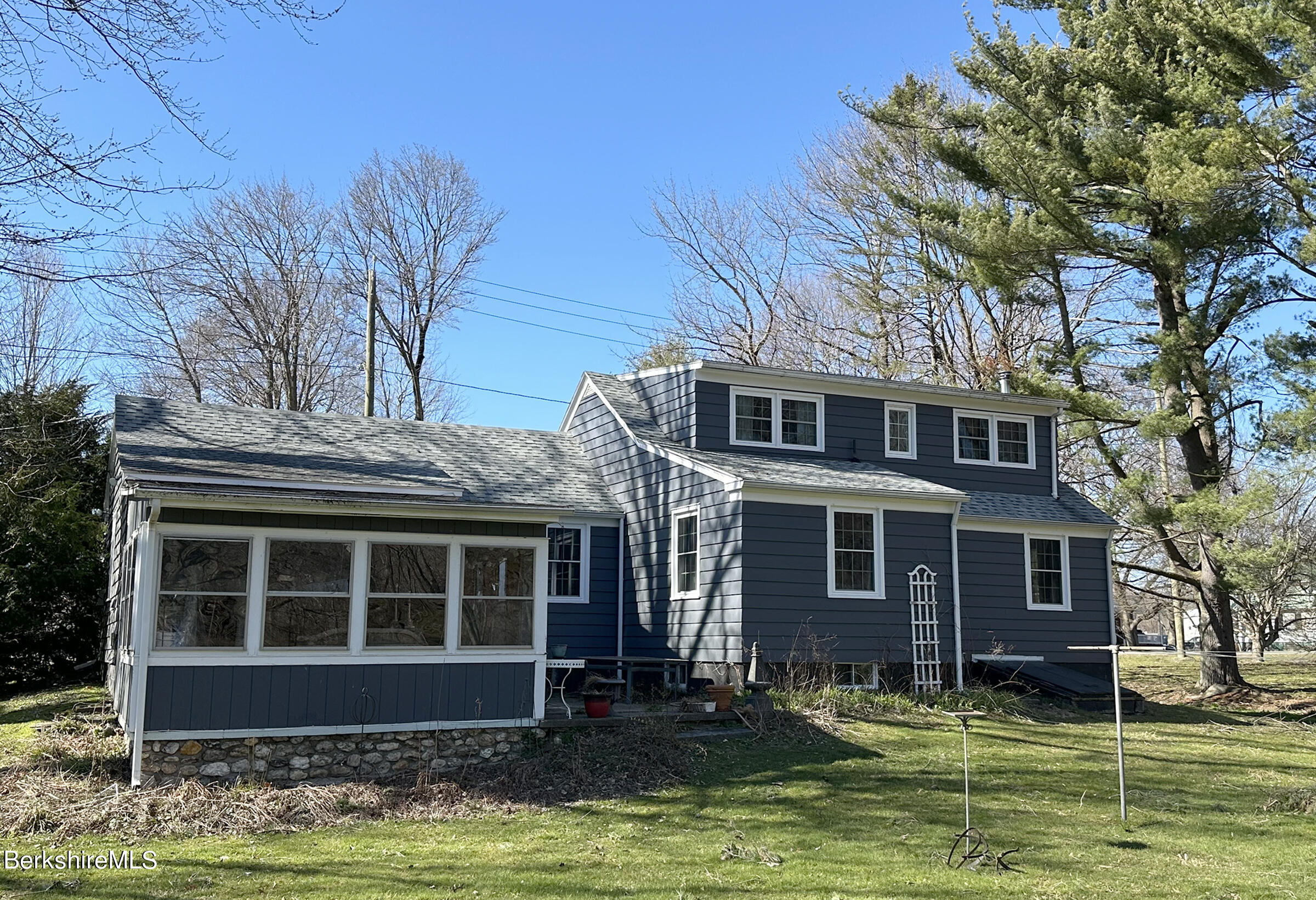 224 County Rte 7A Copake, NY 12516 - Photo 3 of 14 a front view of a house with a yard