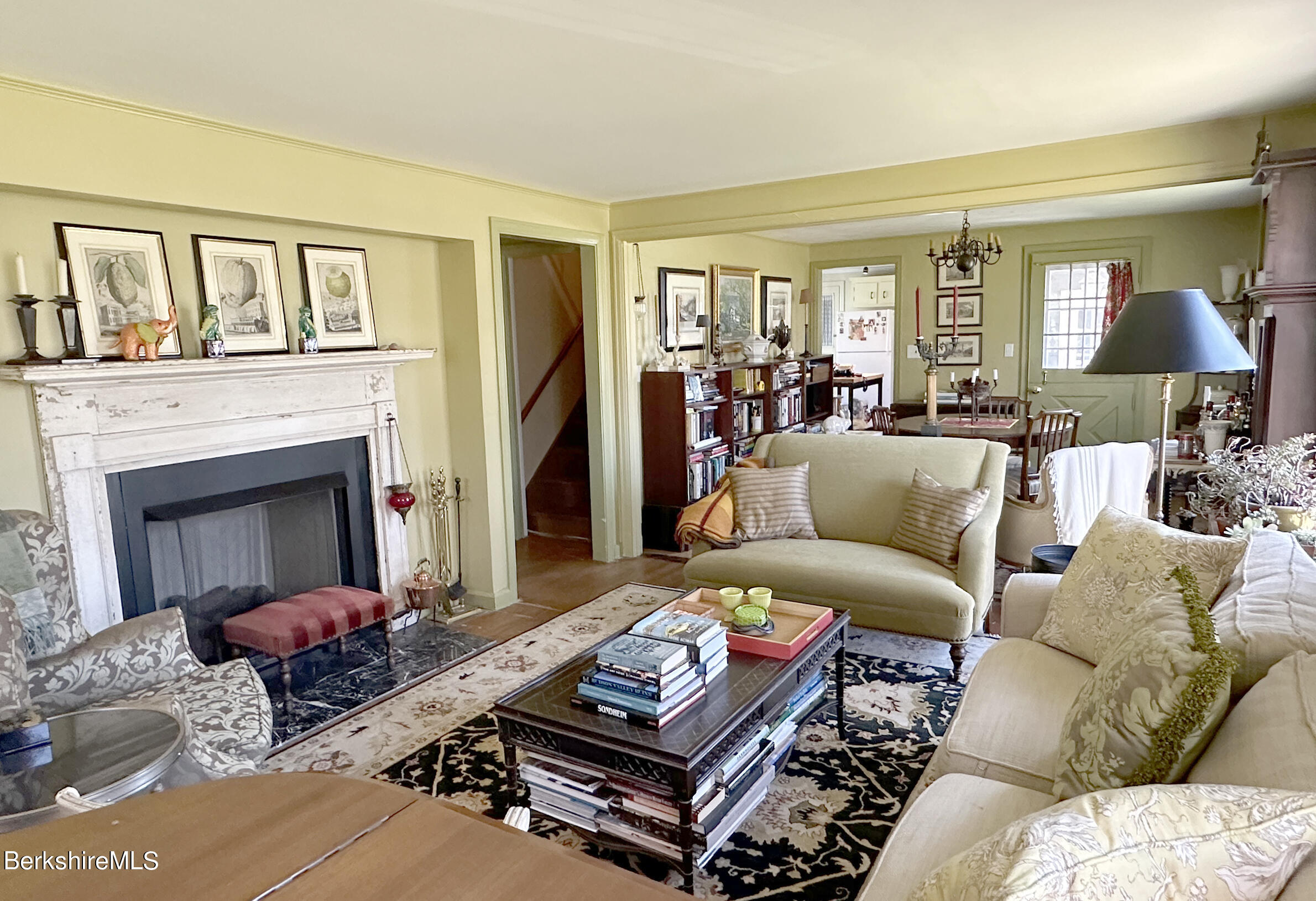 224 County Rte 7A Copake, NY 12516 - Photo 4 of 14 a living room with furniture and a fireplace