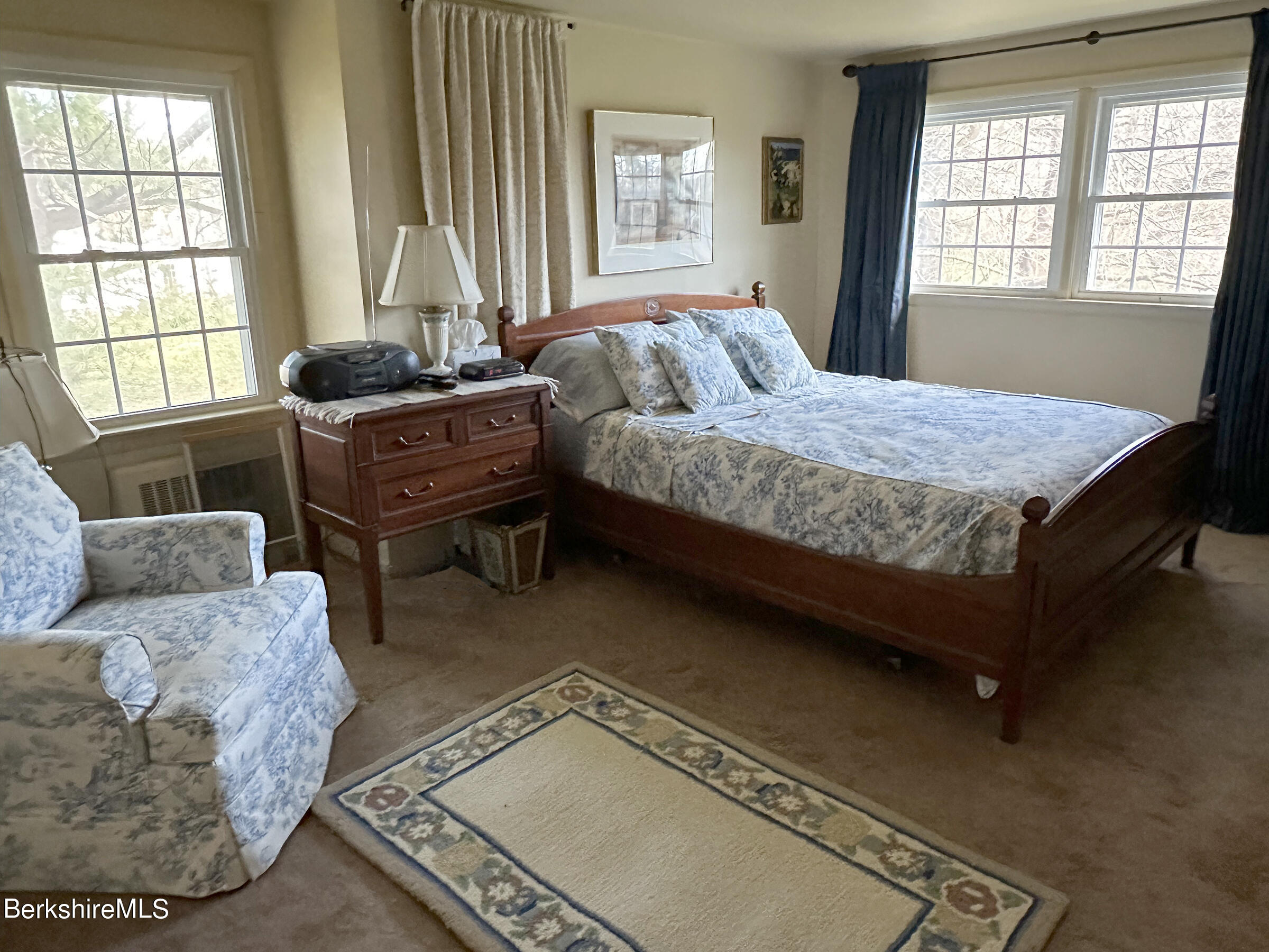 224 County Rte 7A Copake, NY 12516 - Photo 9 of 14 a bedroom with a bed and wooden floor