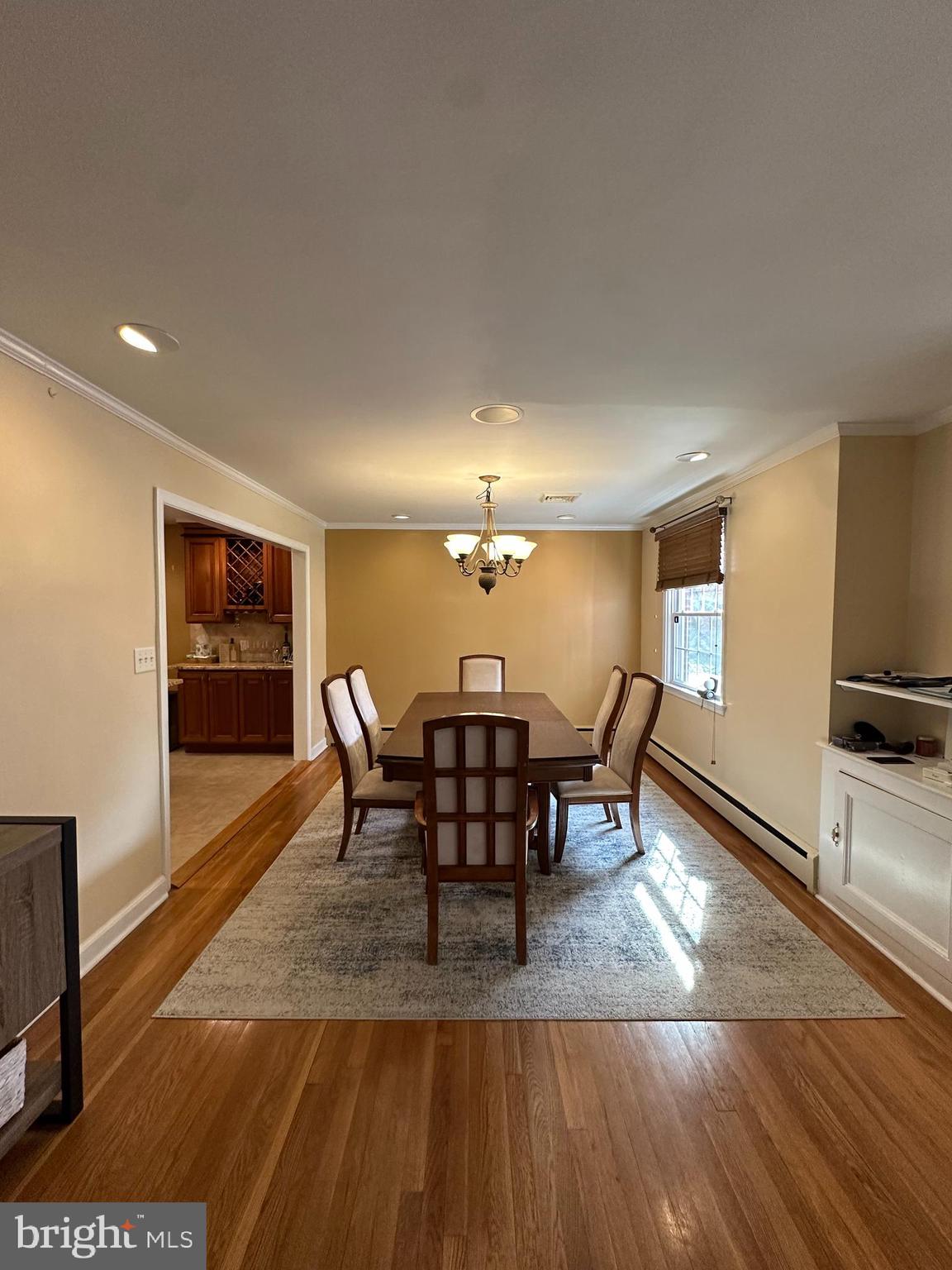 55 Paschall Road Wilmington, DE 19803 - Photo 4 of 18 a view of a dining room with furniture and wooden floor