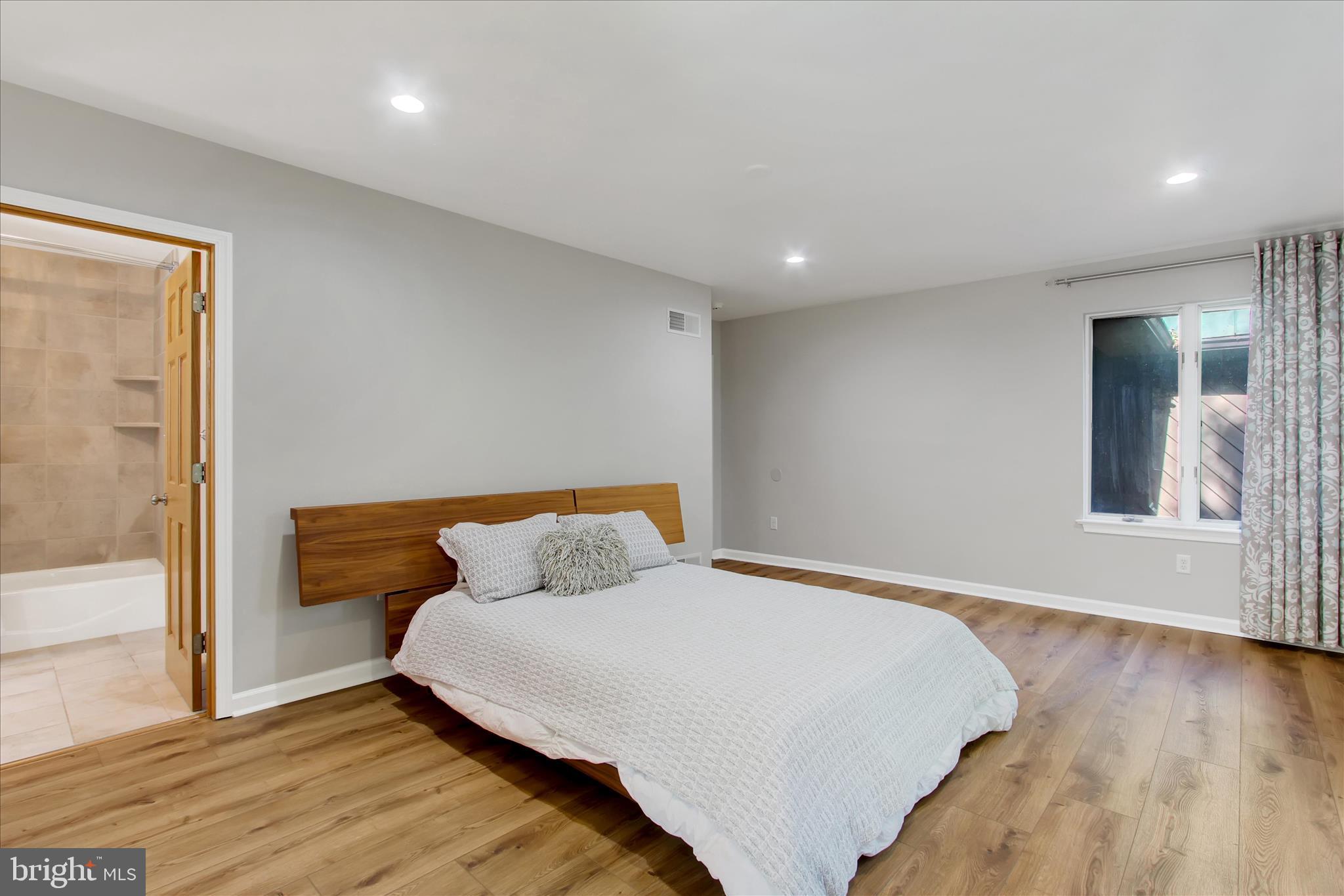 1855 Westwood Road York, PA 17403 - Photo 36 of 60 a bedroom with a bed and wooden floor