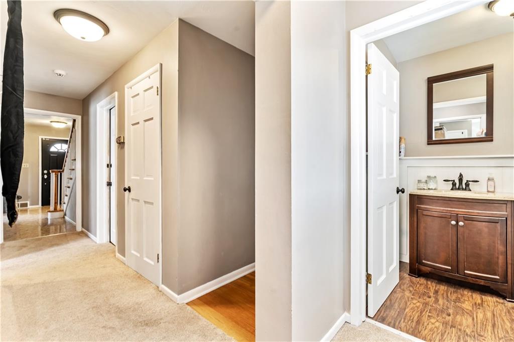 414 Hancock Avenue Vandergrift, PA 15690 - Photo 18 of 25 a spacious bathroom with a mirror a sink and a shower