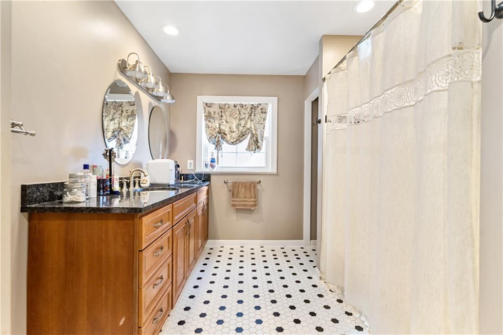 414 Hancock Avenue Vandergrift, PA 15690 - Photo 3 of 25 a kitchen with sink cabinets and window