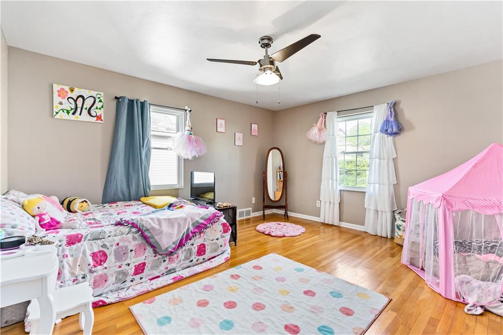 414 Hancock Avenue Vandergrift, PA 15690 - Photo 4 of 25 a bedroom with a bed a window and dresser