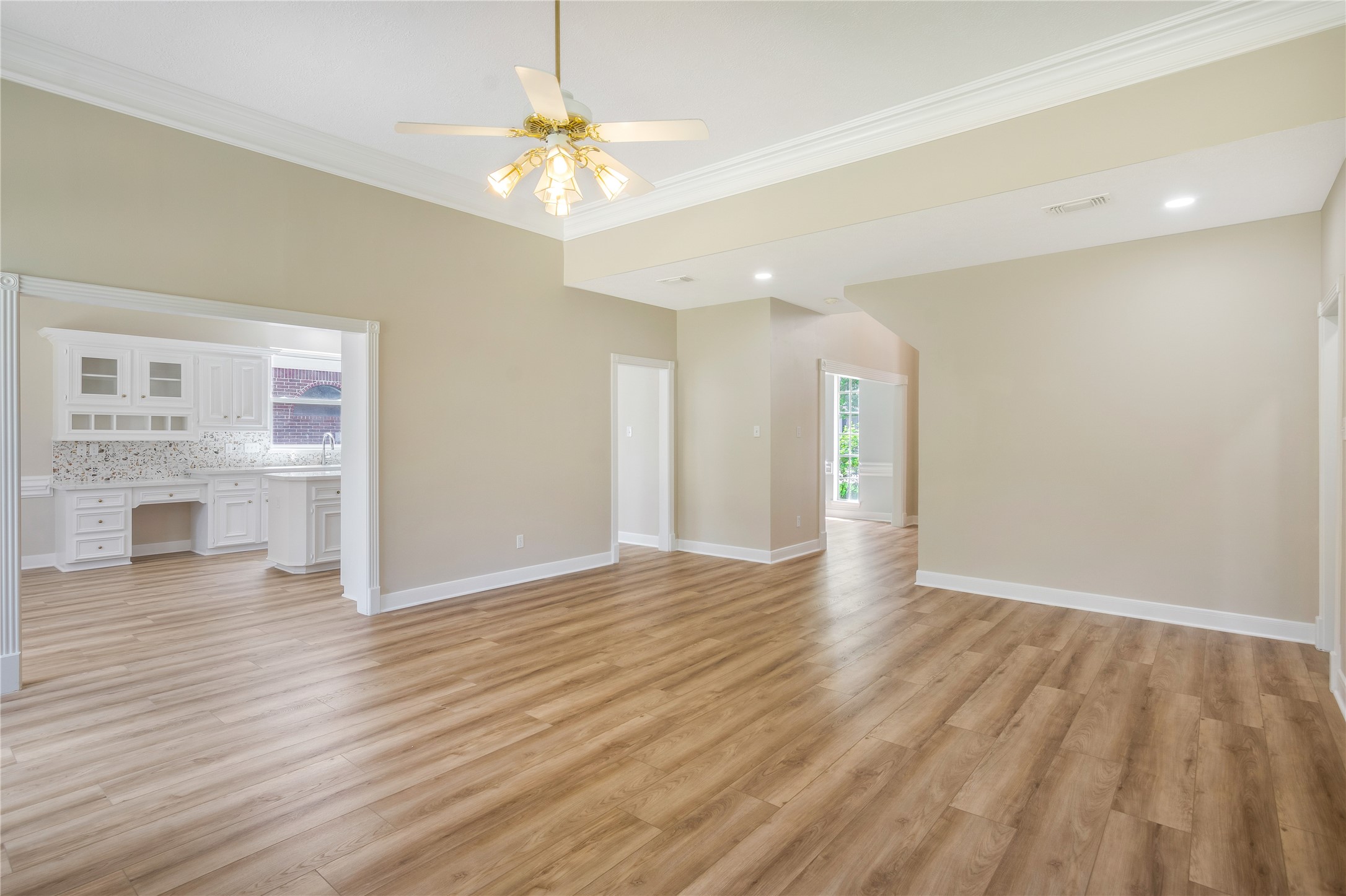 8011 Null Court Spring, TX 77379 - Photo 14 of 41 View from living room to the kitchen.