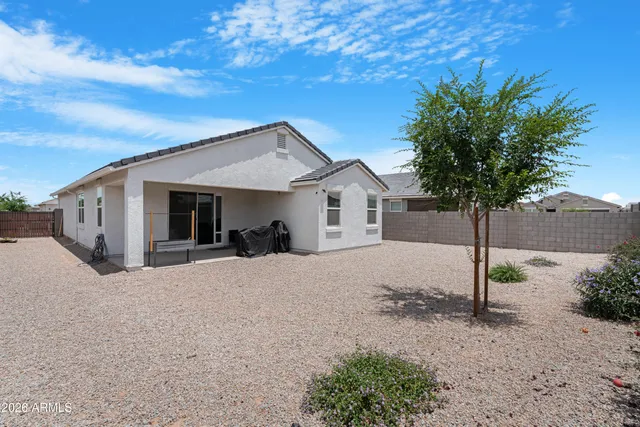 a front view of a house with garage