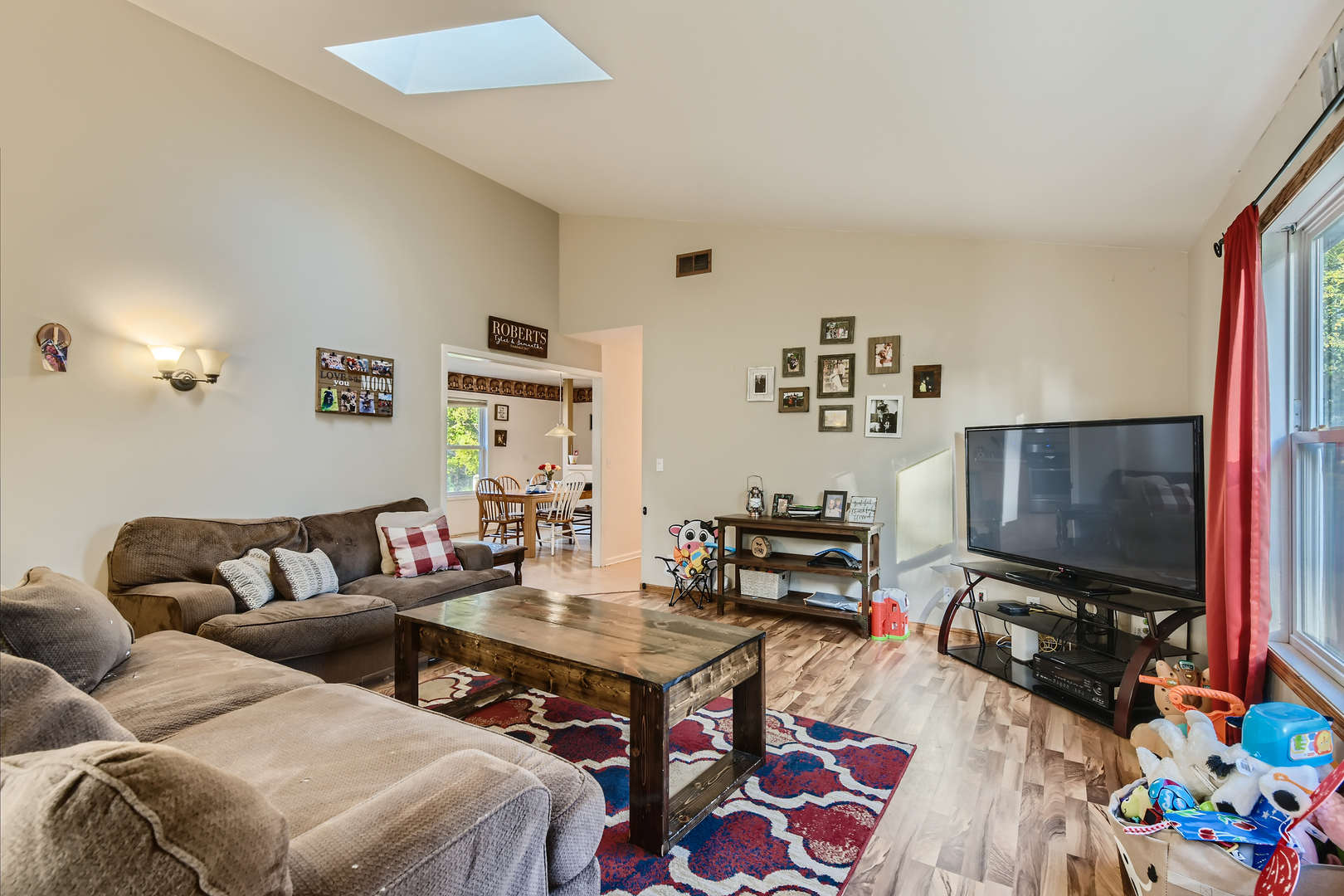 35679 North Helendale Road Ingleside, IL 60041 - Photo 3 of 21 a living room with furniture and a flat screen tv