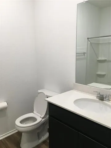 a bathroom with a sink and a toilet
