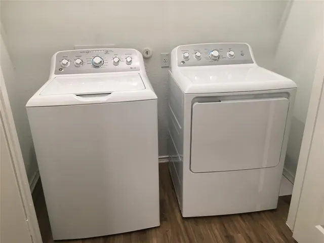 a utility room with dryer and washer