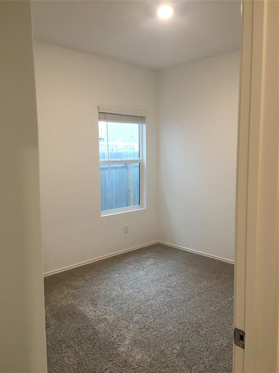 558 Gabbro Gardens Maxwell, TX 78656 - Photo 5 of 29 an empty room with a window